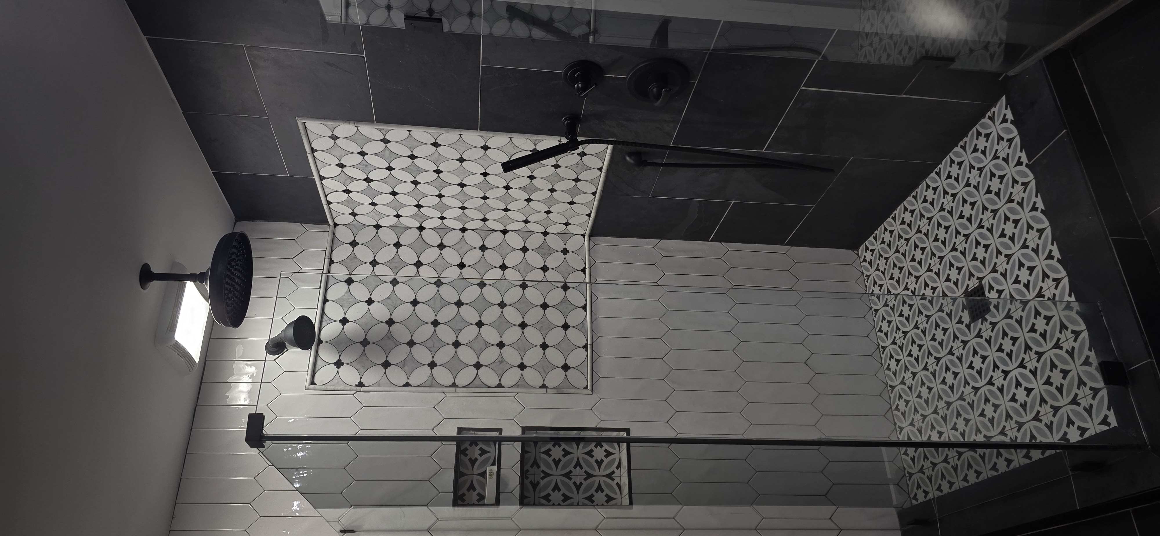 Custom shower with mosaic tile and rain head
