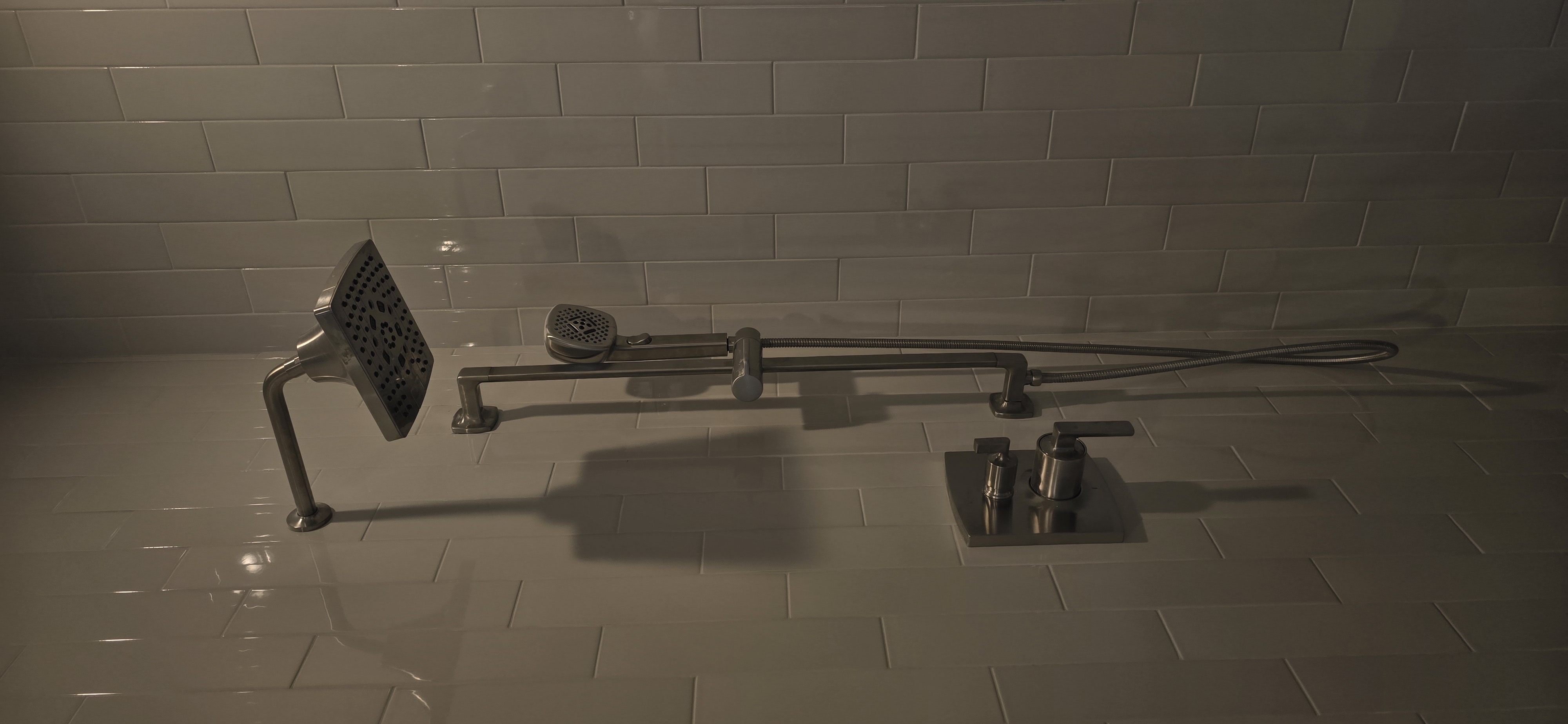 Shower system on glossy tile